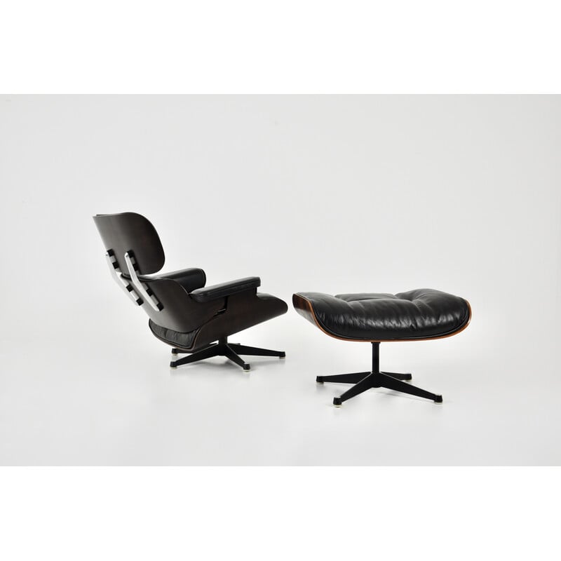 Fauteuil vintage avec ottoman en cuir noir et bois de Charles et Ray Eames pour Icf, 1970