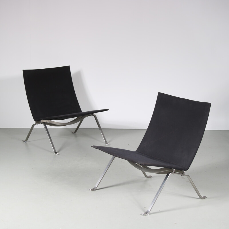 Pair of vintage PK22 chairs in chrome metal and black canvas by Poul Kjaerholm for Fritz Hansen, Denmark 2010
