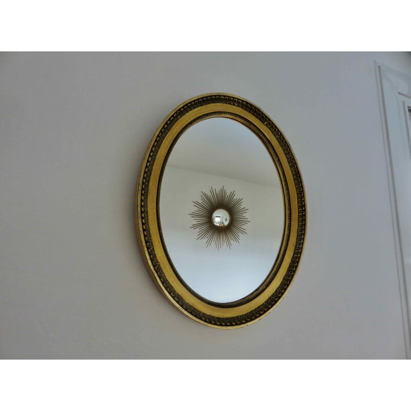 Vintage oval wall mirror in gold resin and wooden back by Louis Philippe, France 1950