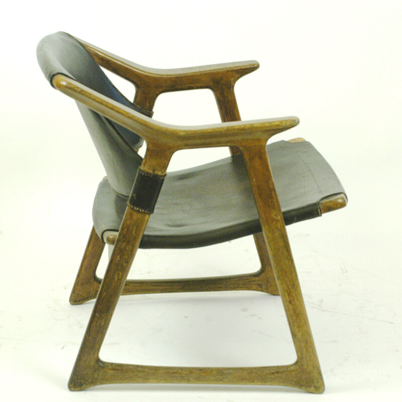 Scandinavian oak and leather lounge chair by Rastad - 1960s