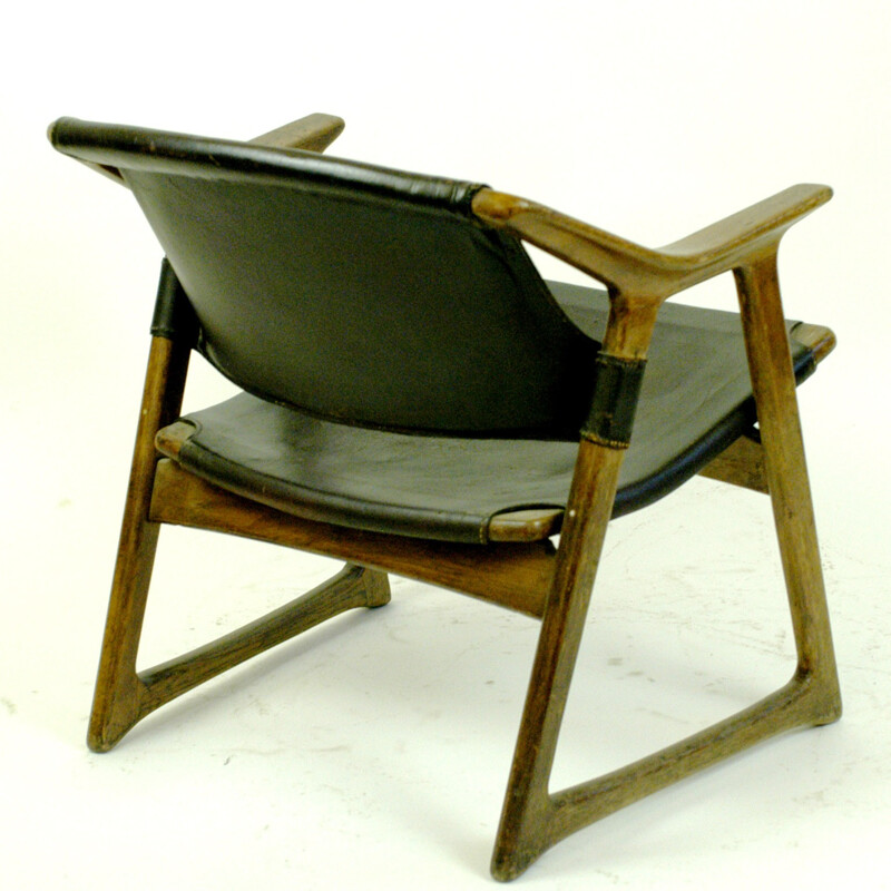 Scandinavian oak and leather lounge chair by Rastad - 1960s