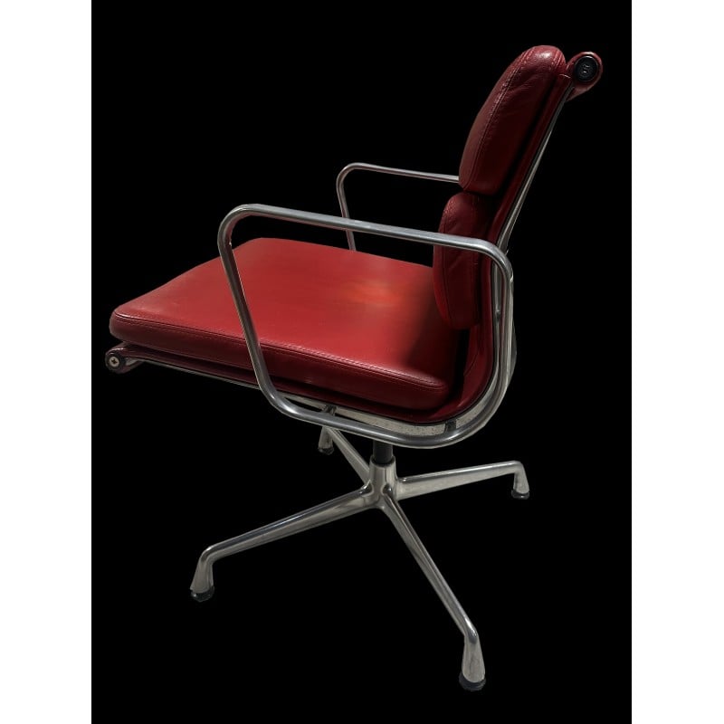 Vintage model 209 swivel armchair in red leather by Eames