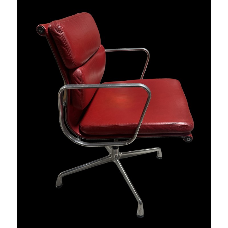 Vintage model 209 swivel armchair in red leather by Eames