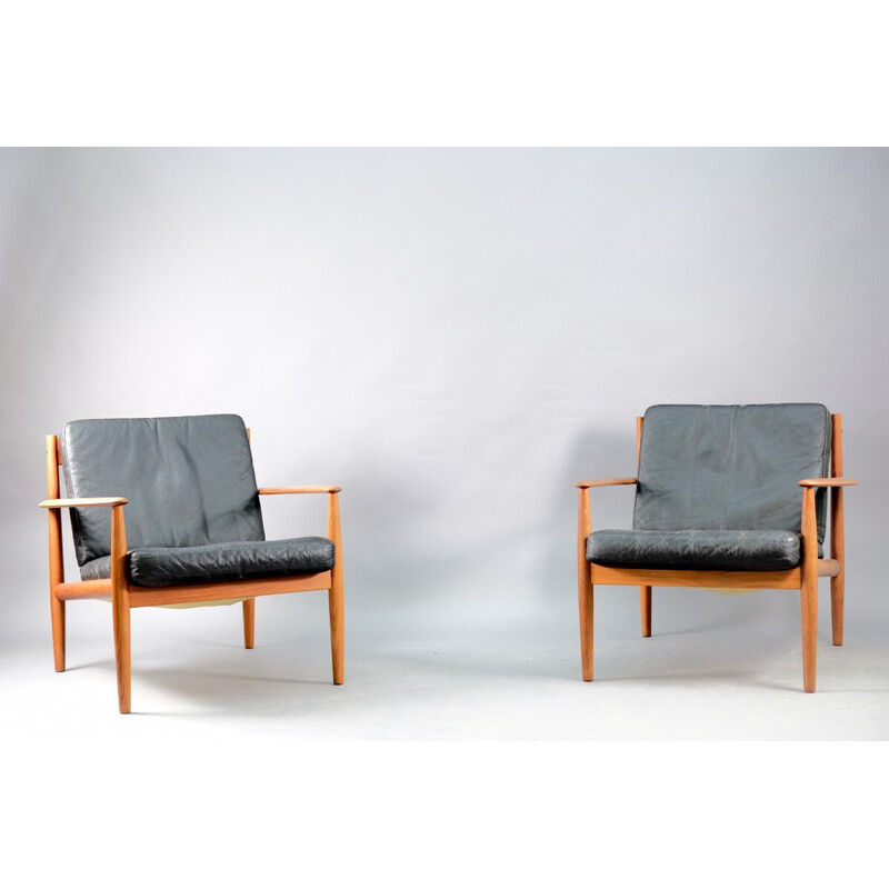 Pair of vintage teak and black leather armchairs by Grete Jalk for France et Søn