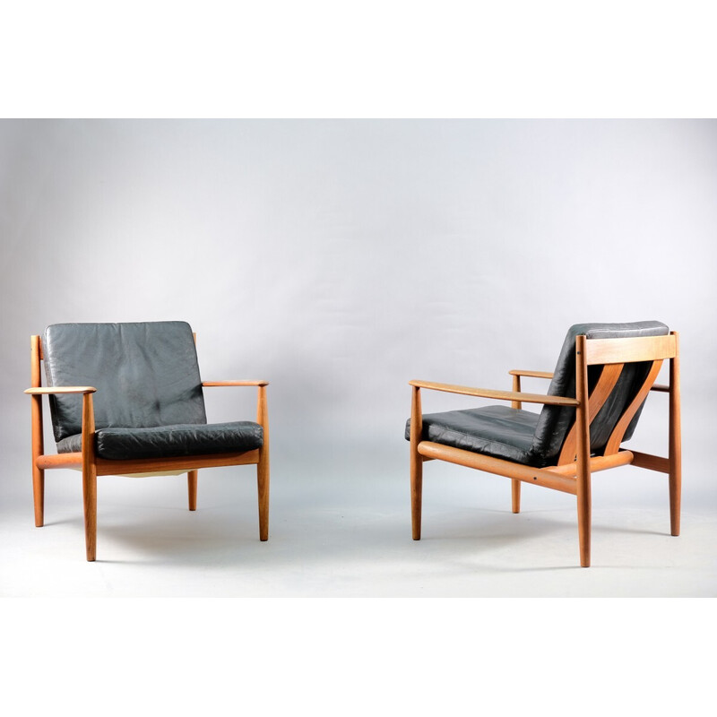 Pair of vintage teak and black leather armchairs by Grete Jalk for France et Søn