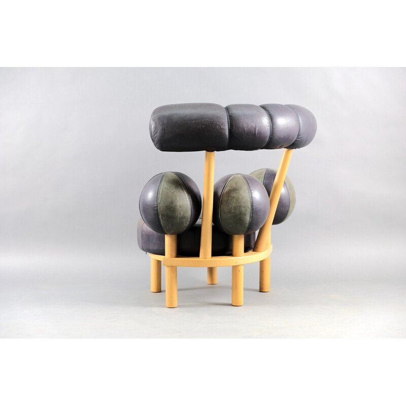 Vintage leather and wood armchair by Peter Opsvik for Stokke, Norway