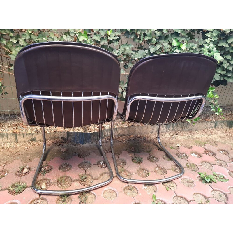 Pareja de sillas de comedor vintage revestidas de piel de vacuno de Gastone Rinaldi, Italia años 60