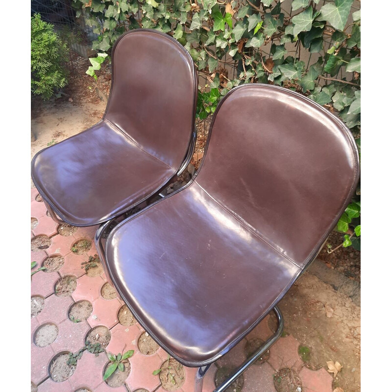 Pair of vintage dining chairs covered with cow leather by Gastone Rinaldi, Italy 1960s