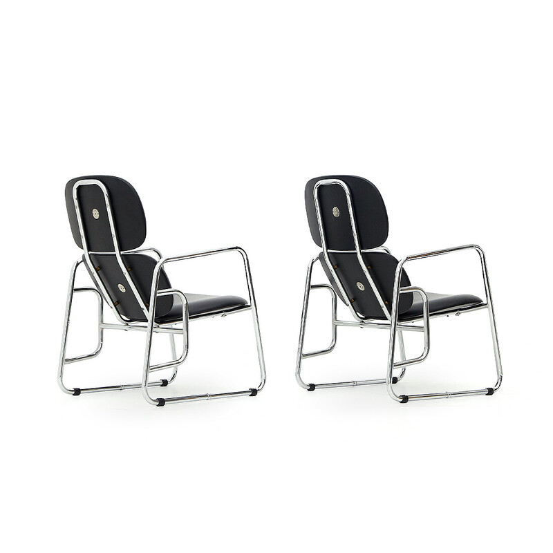 Pair of vintage armchairs in chrome metal and black imitation leather, Italy 1960