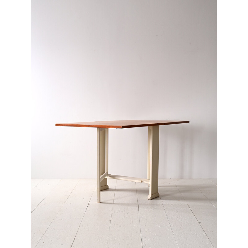 Vintage dining table with teak and wood wings by Carl Malmsten