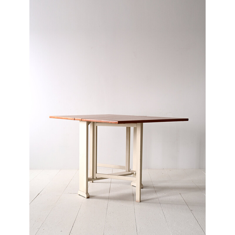 Vintage dining table with teak and wood wings by Carl Malmsten