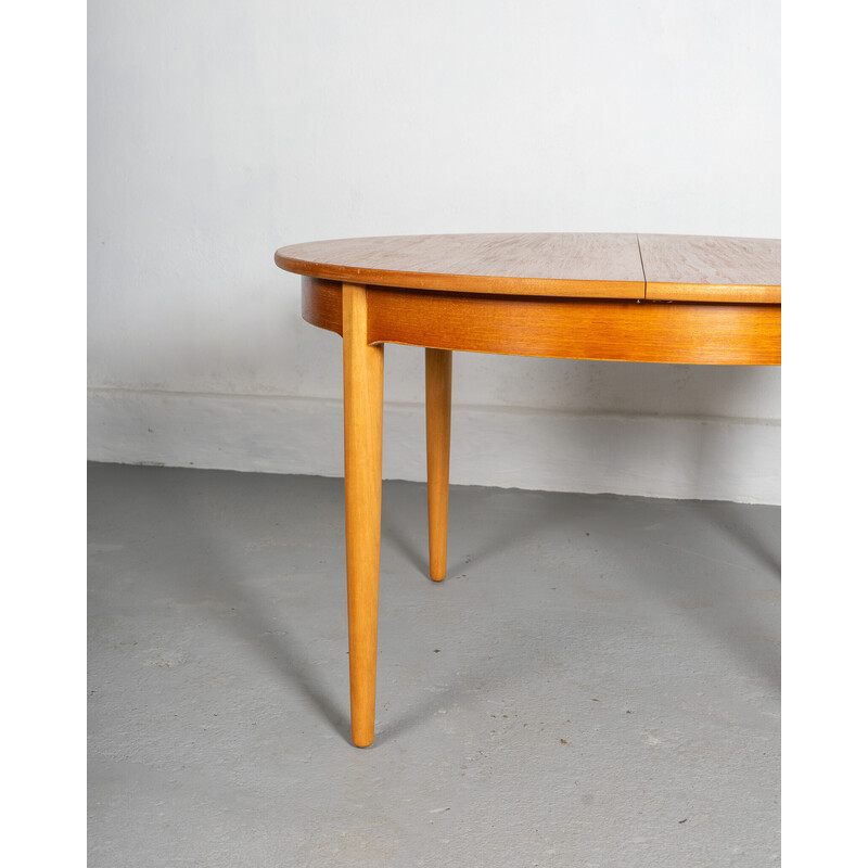 Vintage round extendable dining table in beech and teak by Nathan UK