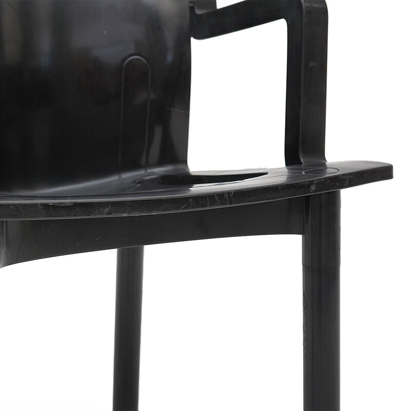 Set of 4 vintage chairs model “4870” in molded black plastic by Anna Castelli for Kartell, Italy 1980