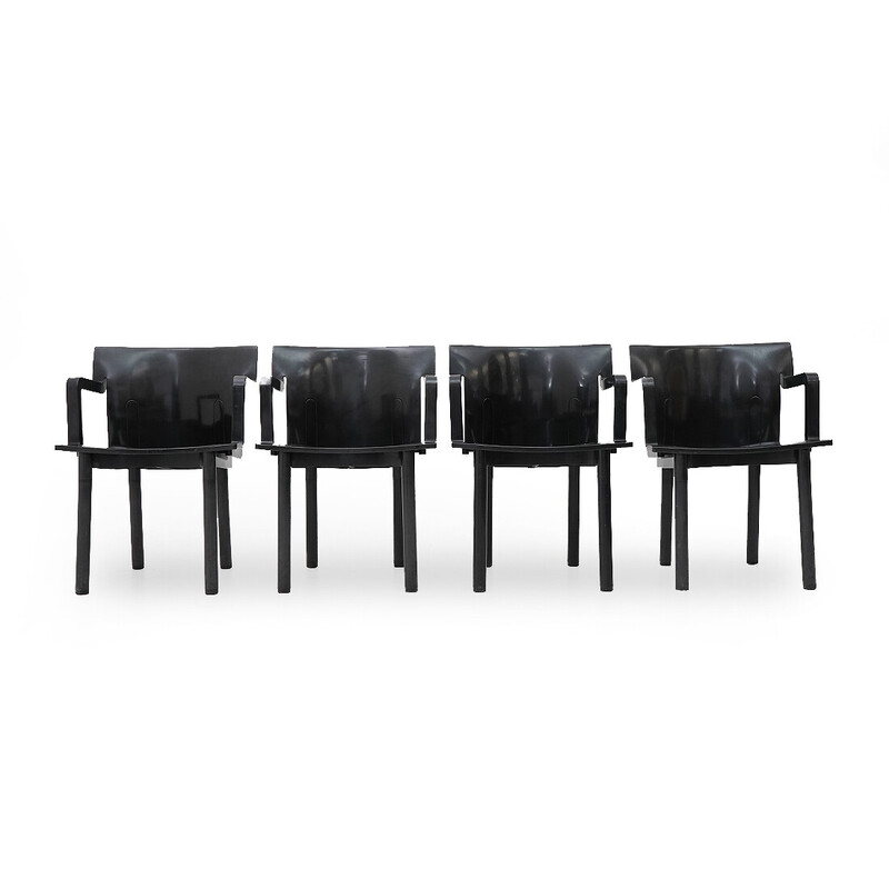 Set of 4 vintage chairs model “4870” in molded black plastic by Anna Castelli for Kartell, Italy 1980