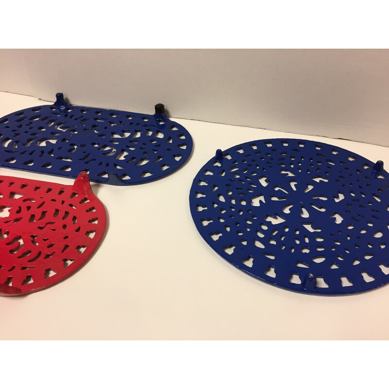 Set of 4 vintage enamelled cast-iron trivets