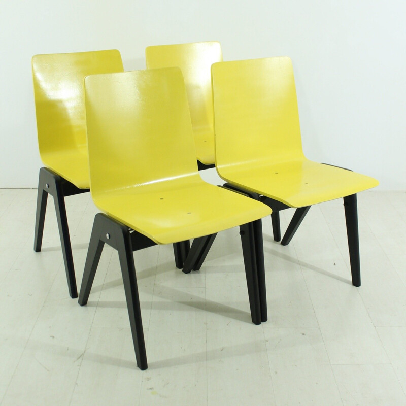 Set of 4 mid-century yellow and black chairs - 1960s