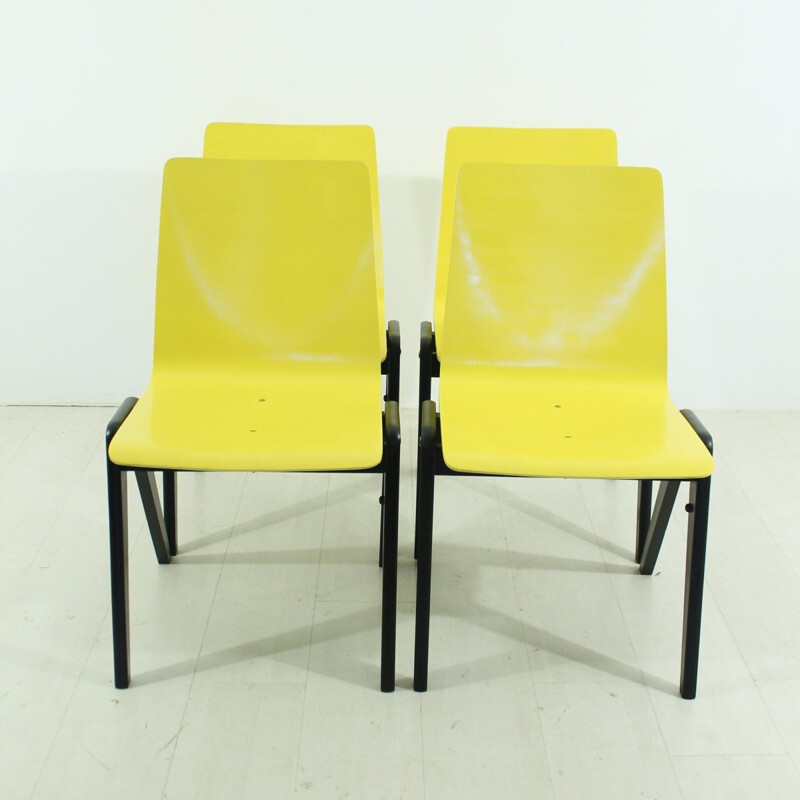 Set of 4 mid-century yellow and black chairs - 1960s