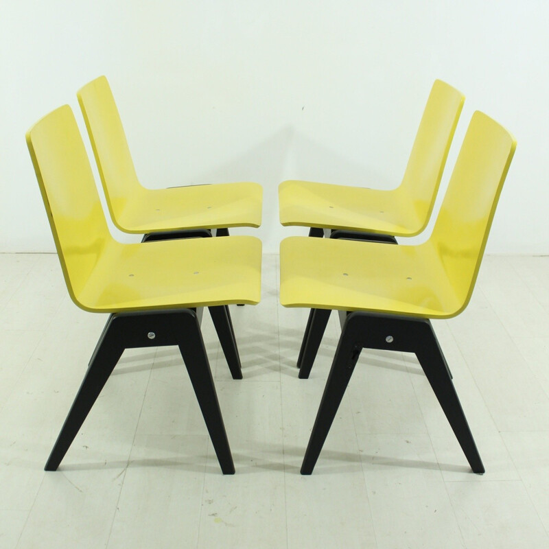 Set of 4 mid-century yellow and black chairs - 1960s