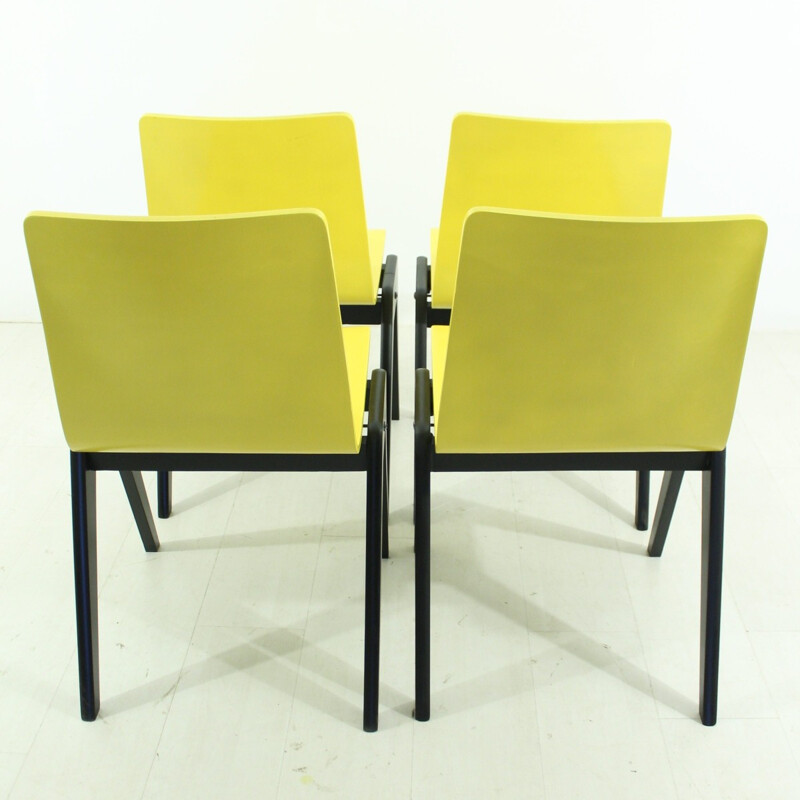 Set of 4 mid-century yellow and black chairs - 1960s