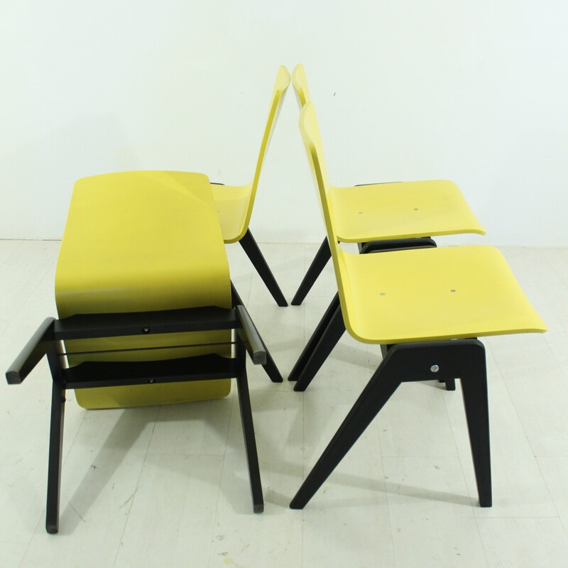 Set of 4 mid-century yellow and black chairs - 1960s