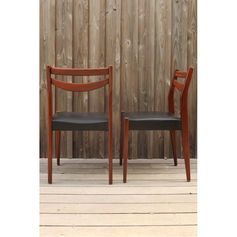 Pair of vintage teak and skai chairs
