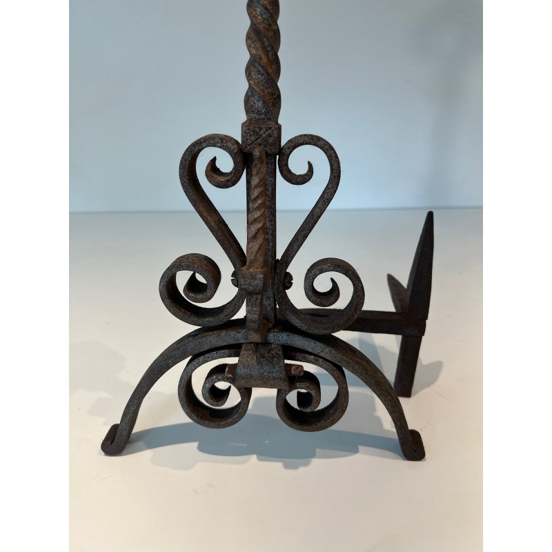 Pair of vintage wrought iron andirons decorated with foliage and scrolls, 1900