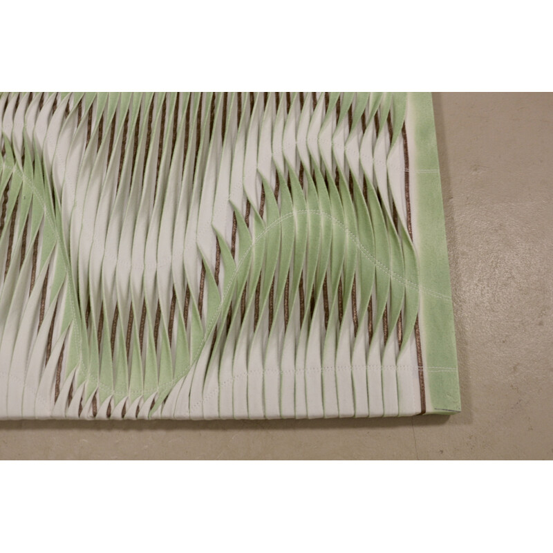 Vintage textured painting with wave effect by pleating light green color