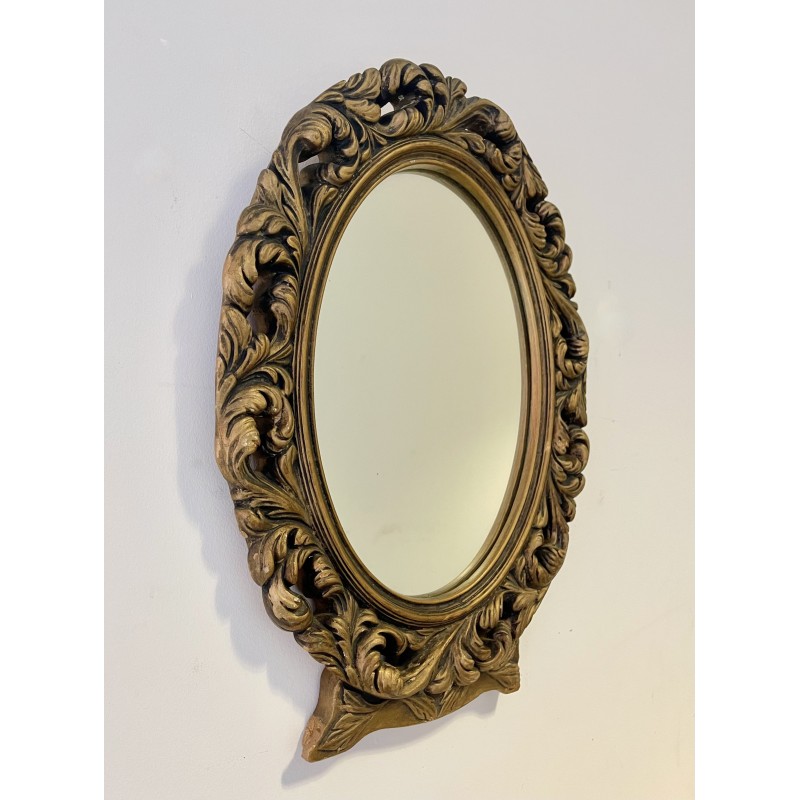 Vintage oval mirror with a carved gold frame, 1960