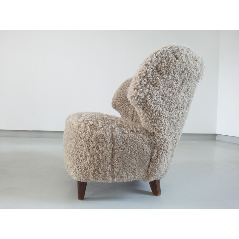 Pair of vintage sheepskin armchairs by Carl-Johan Boman for Oy Boman Ab, Finland 1940