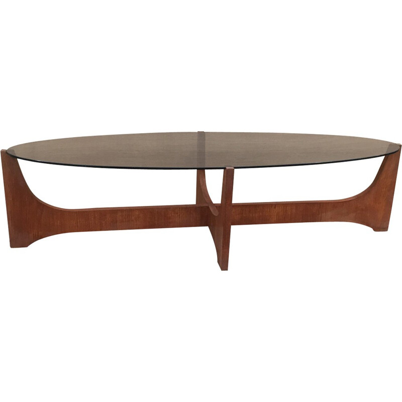 Oval coffee table with a teak base and a smoked glass top by Hugues Poignant - 1960s