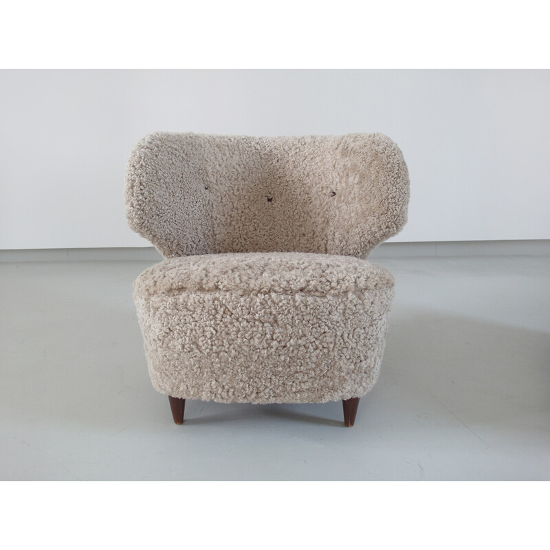 Pair of vintage sheepskin armchairs by Carl-Johan Boman for Oy Boman Ab, Finland 1940