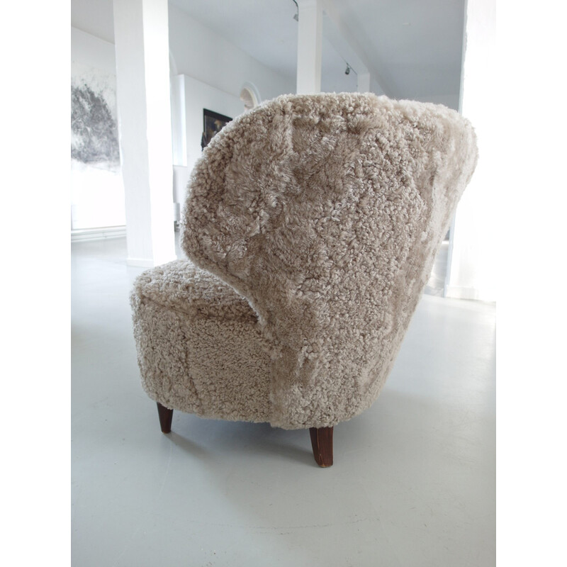 Pair of vintage sheepskin armchairs by Carl-Johan Boman for Oy Boman Ab, Finland 1940