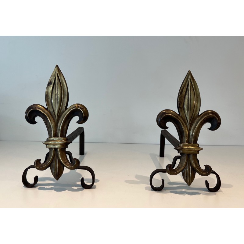 Pair of vintage bronze and wrought iron andirons representing a fleur-de-lys, France 1940