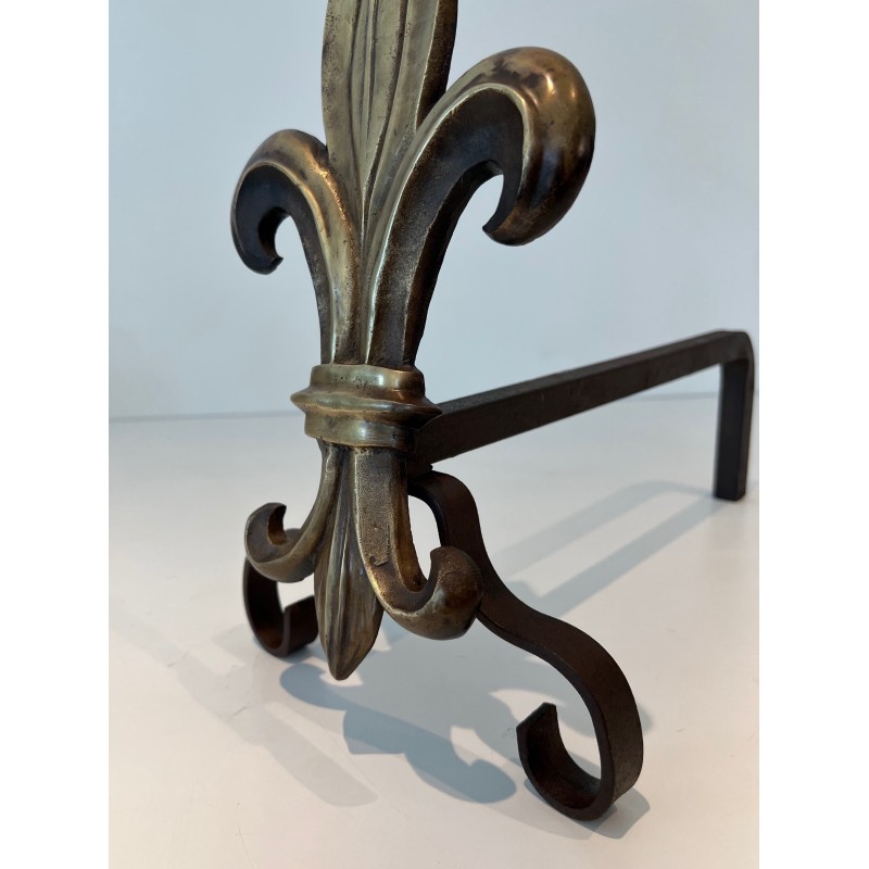 Pair of vintage bronze and wrought iron andirons representing a fleur-de-lys, France 1940