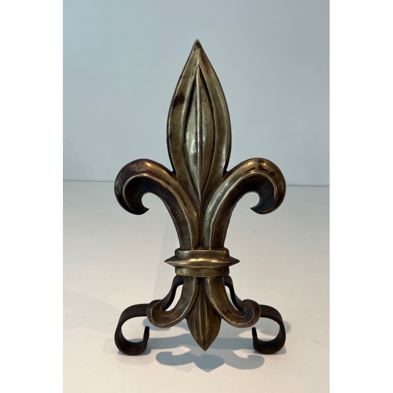 Pair of vintage bronze and wrought iron andirons representing a fleur-de-lys, France 1940