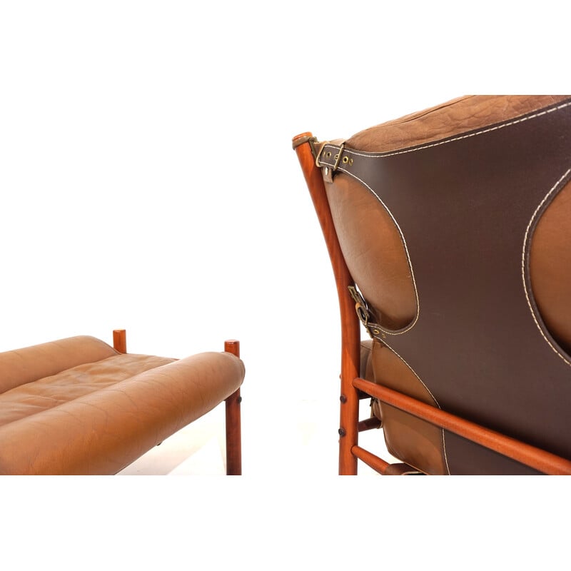 Vintage Inka armchair with beech wood and aniline leather pouf by Arne Norell for Möbelmanufaktur Norell AB, Sweden 1968