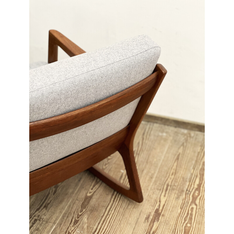 Vintage rocking chair in solid teak by Ole Wanscher for France and Son, Denmark 1950