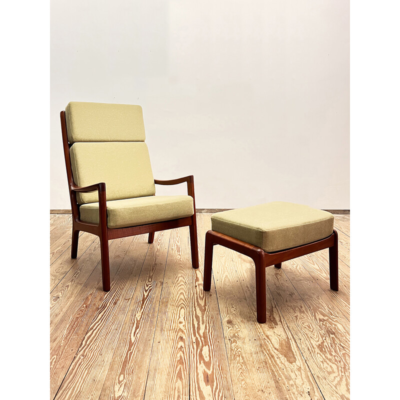 Vintage armchair with ottoman in solid teak wood by Ole Wanscher for Poul Jeppensens, Denmark 1960