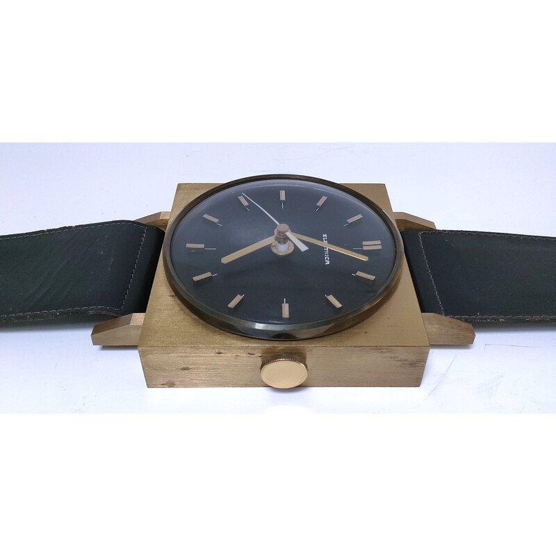 Vintage wandklok in de vorm van een horloge met zwarte imitatieleren band, 1970