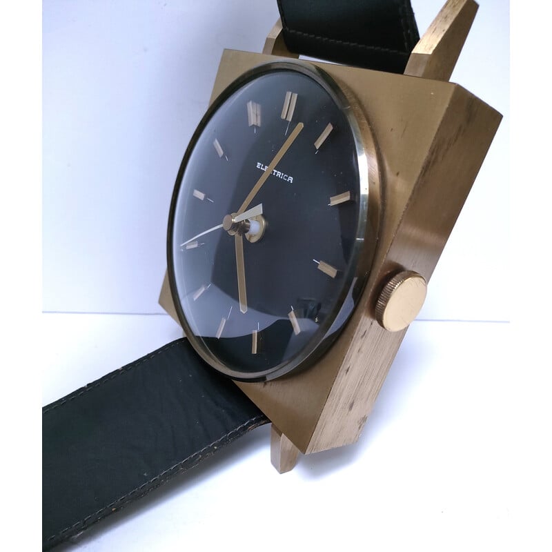 Vintage wall clock in the shape of a black imitation leather wristwatch, 1970