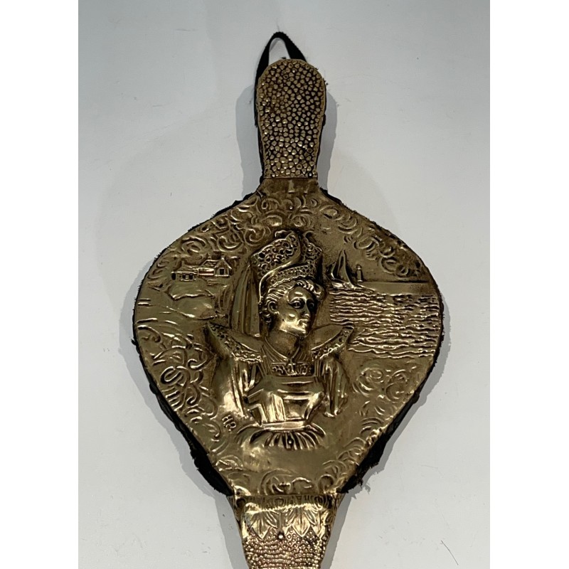 Vintage fireplace bellows in embossed brass with the image of a woman, France 1900