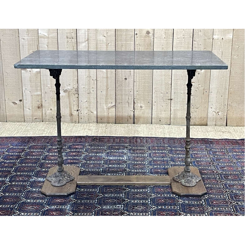 Vintage bistro table in oak and cast iron