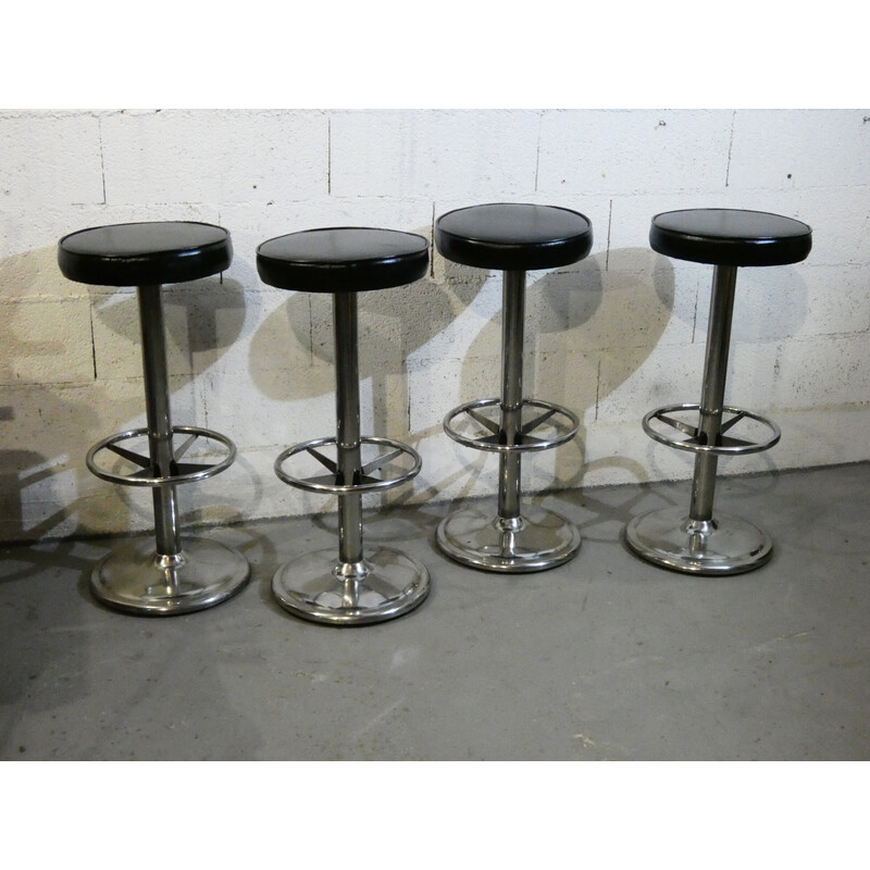 Set of 4 vintage stools in polished stainless steel and black skai, 1970