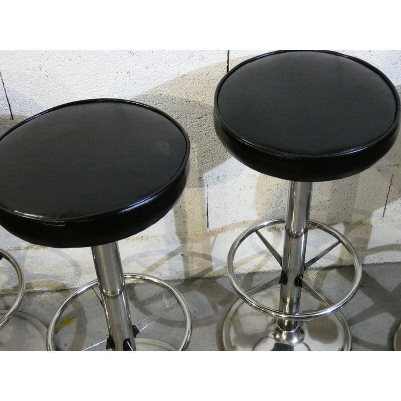 Lot de 4 tabourets vintage en inox poli et skai noir, 1970