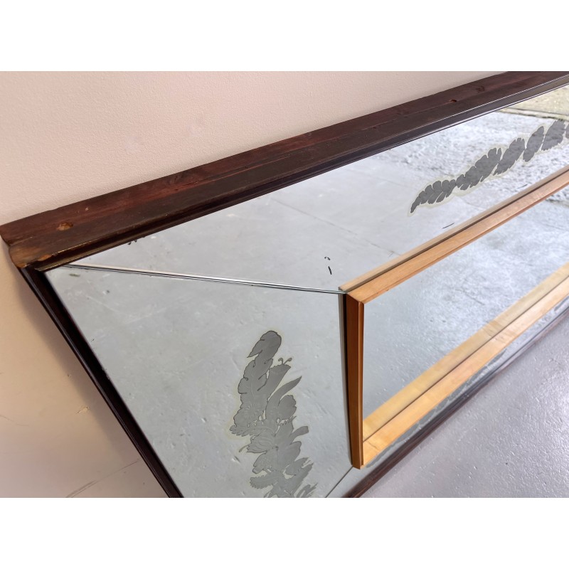 Vintage wall mirror with a concave top edge