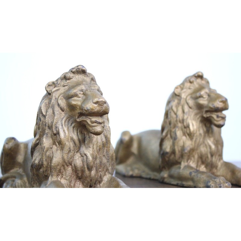 Paar vintage gietijzeren leeuwen