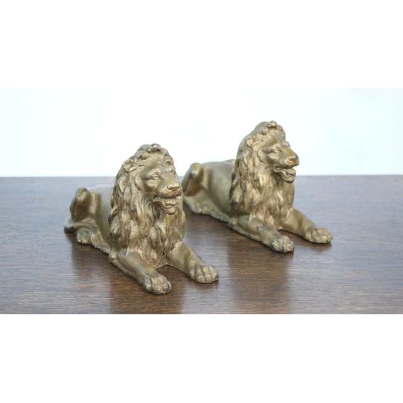 Paar vintage gietijzeren leeuwen