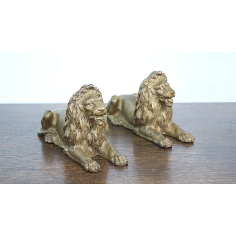 Pair of vintage cast iron lions