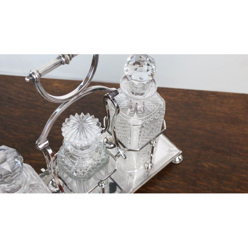 Vintage Victorian Silver Tantalus 3 Bottle Decanter Set