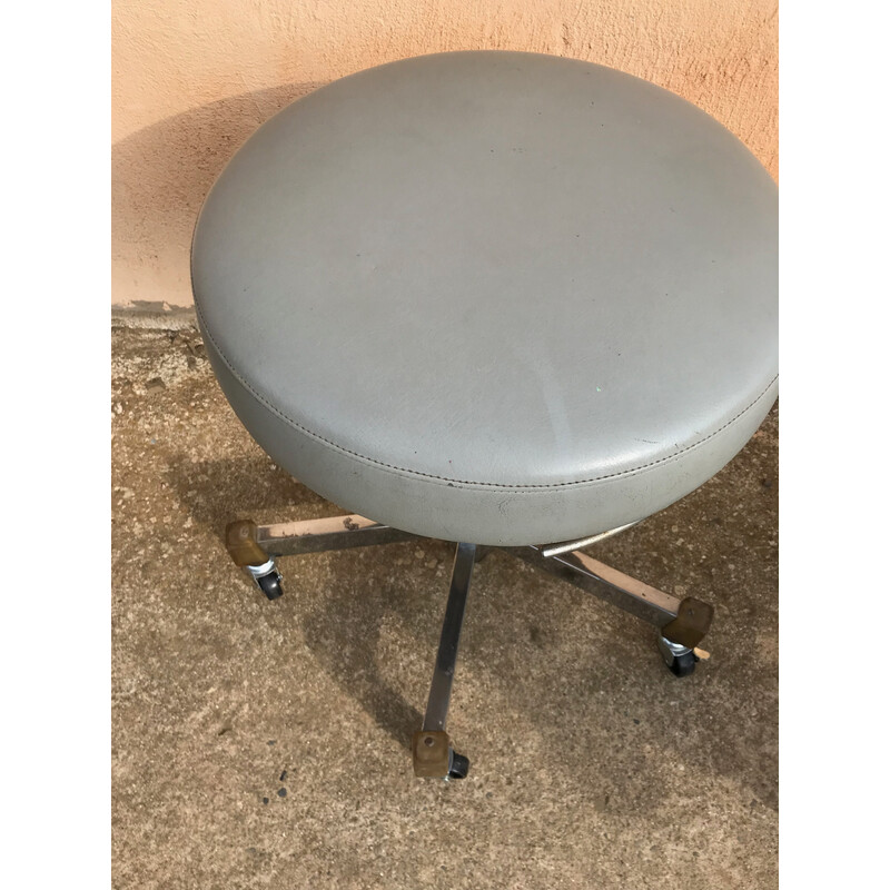 Vintage adjustable stool on casters